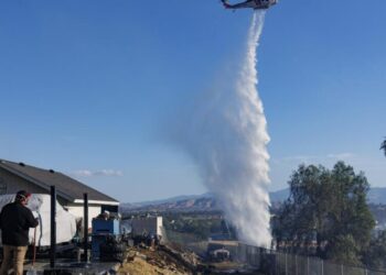 Brush fire in Riverside County triggers evacuations, damages at least one home