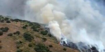 Growing brush fire triggers evacuation warnings in Orange County