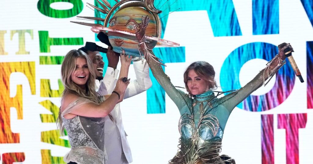 A major fail on live TV put a target on this pop star’s back. Winning ‘The Masked Singer’ might erase it