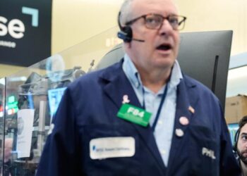 Wall Street rallies to the edge of its all-time high as oil prices ease