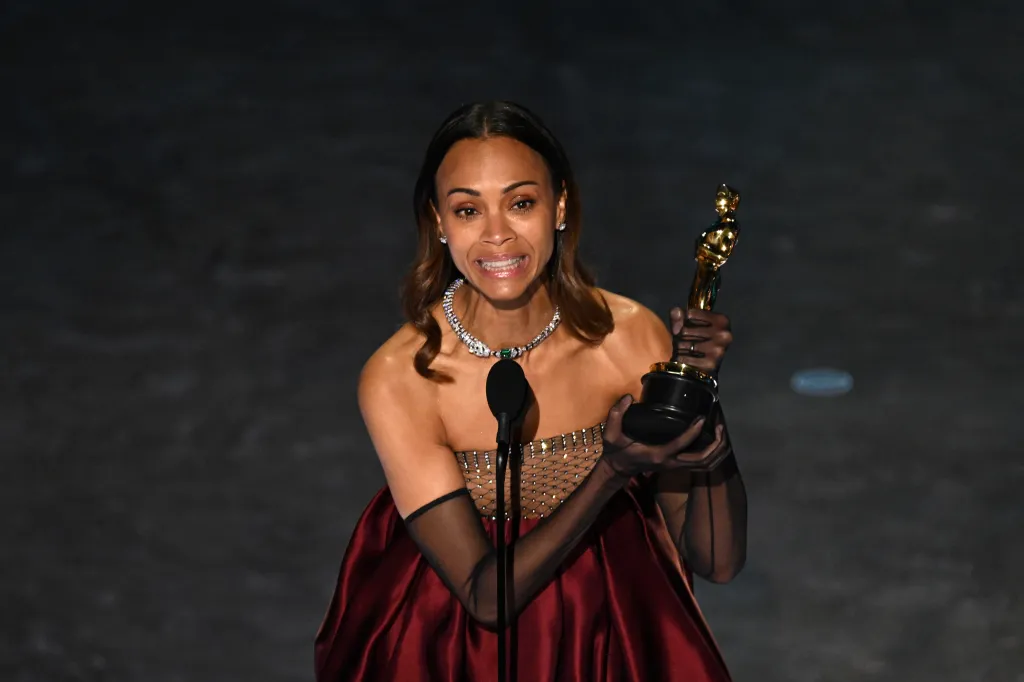 Zoe Saldana accepting the Best Actress in a Supporting Role award for 