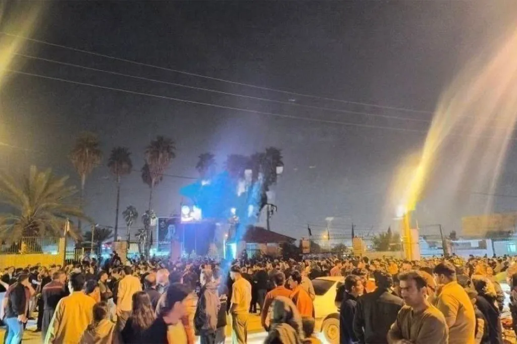 Crowds of Iranians take to the street after reports of gunfire in Iran.