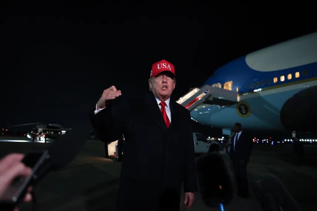 President Donald Trump speaks the the media after disembarking from Air Force One on April 12, 2026 at Joint Base Andrews, Maryland.