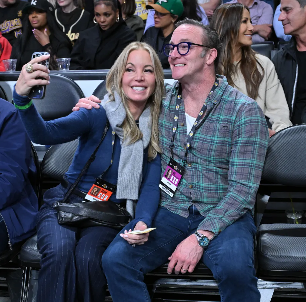 Jeanie Buss and Jay Mohr pose for a selfie at a Lakers game.