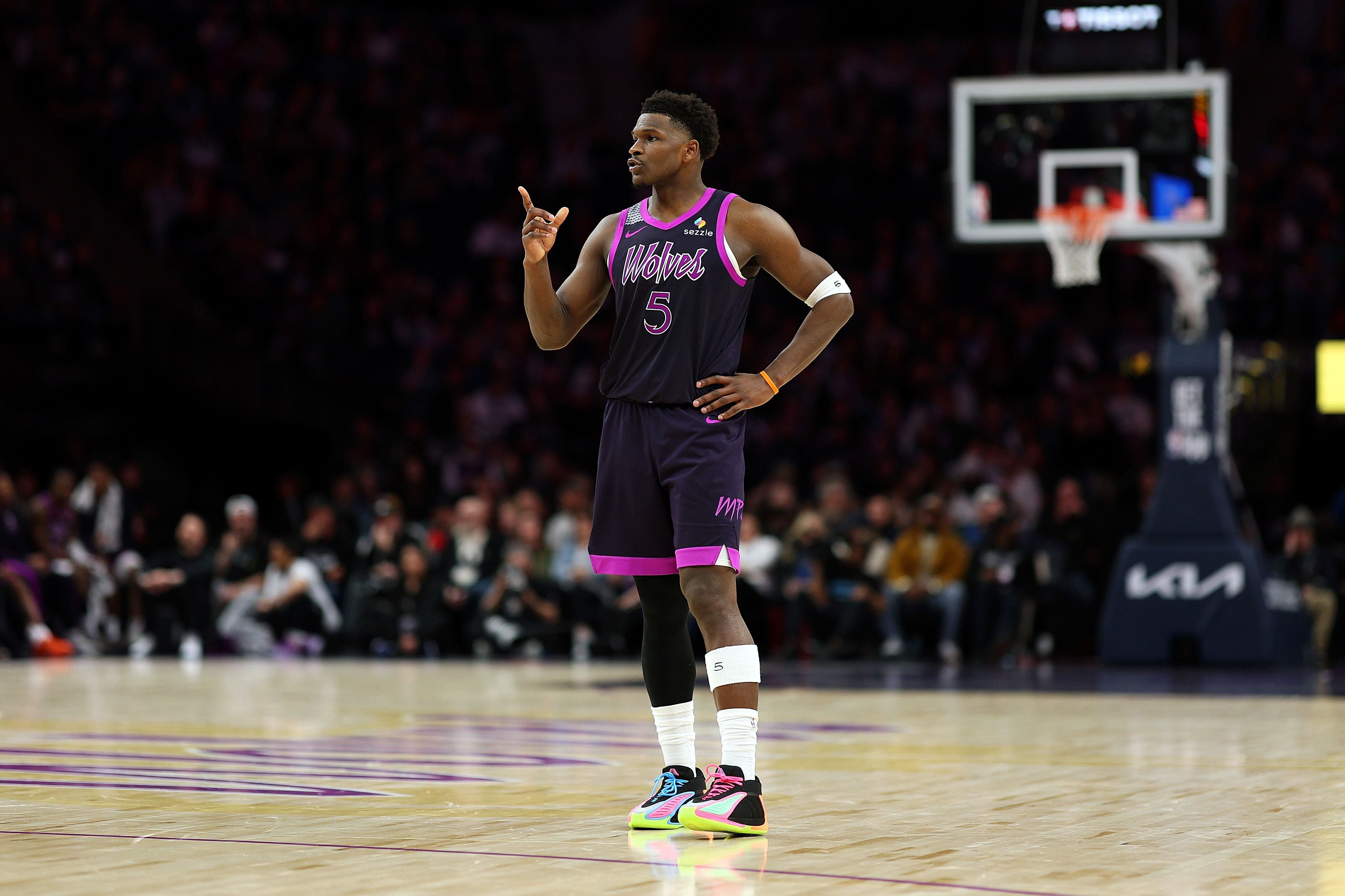 Anthony Edward of the Minnesota Timberwolves looking on during a game.