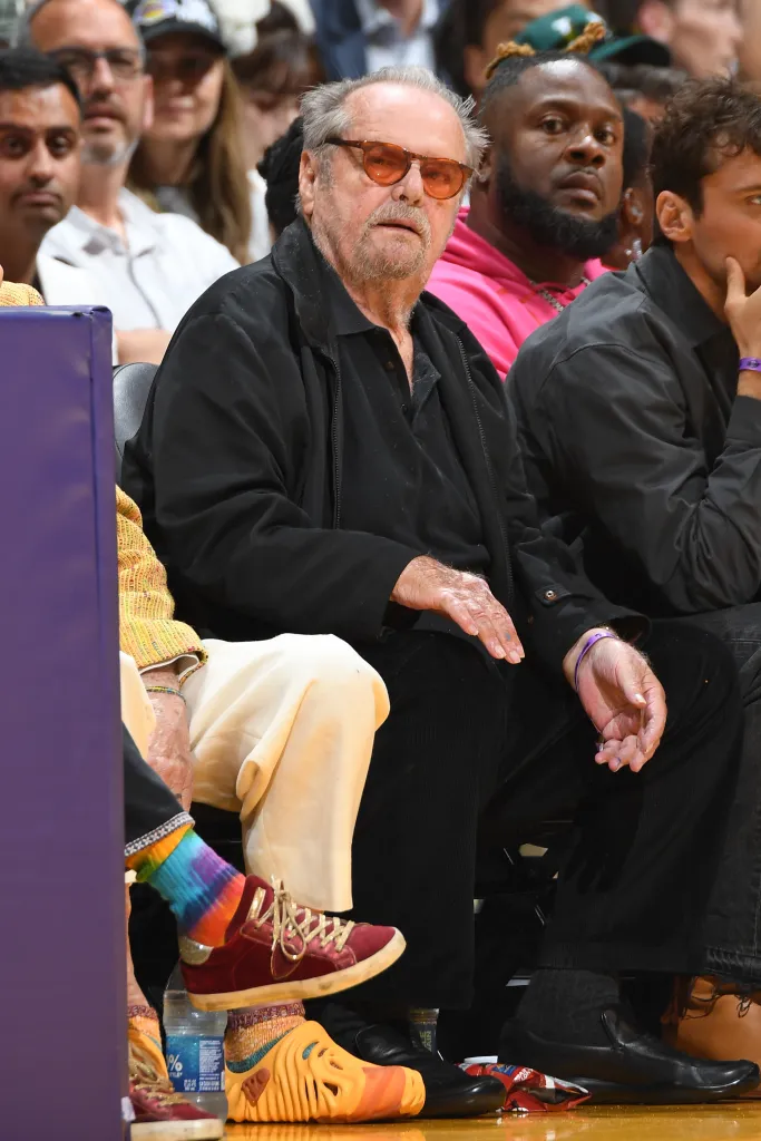 Jack Nicholson watching a basketball game.