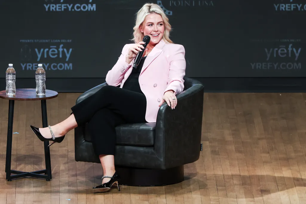 Karoline Leavitt speaking at a Turning Point USA event at George Washington University.