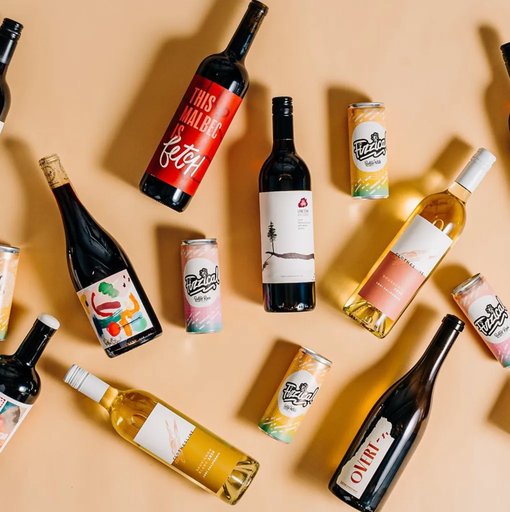 An assortment of wine bottles and cans from eStCru Wines.