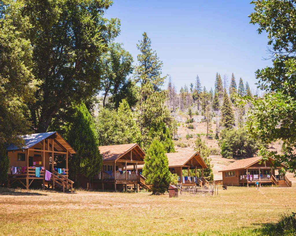 Cabins at Camp Tawonga with clothes drying on the porches.