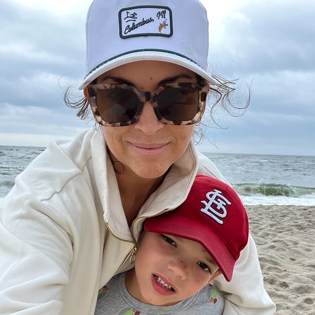 Brittany Watts and her son, Nelson, posing on a beach.