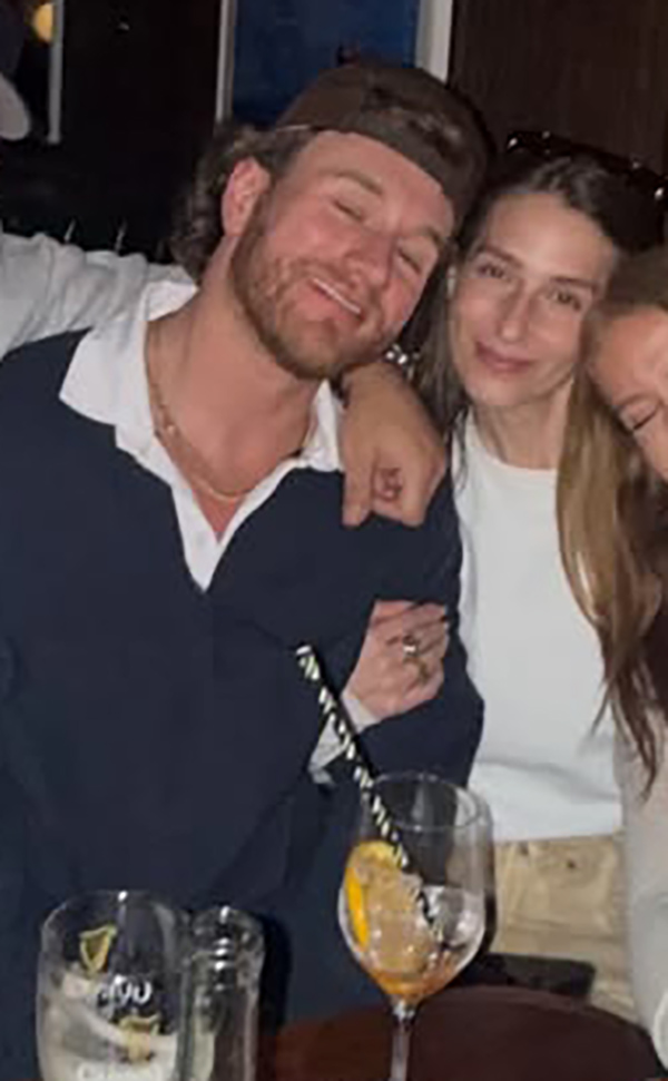 West Wilson and Amanda Batula smiling together.