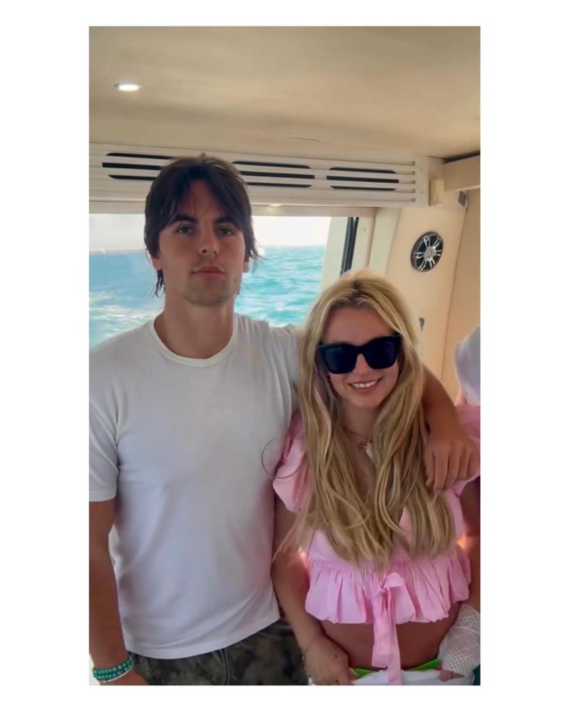 Britney Spears' son, Sean Preston, and a blonde woman on a boat.