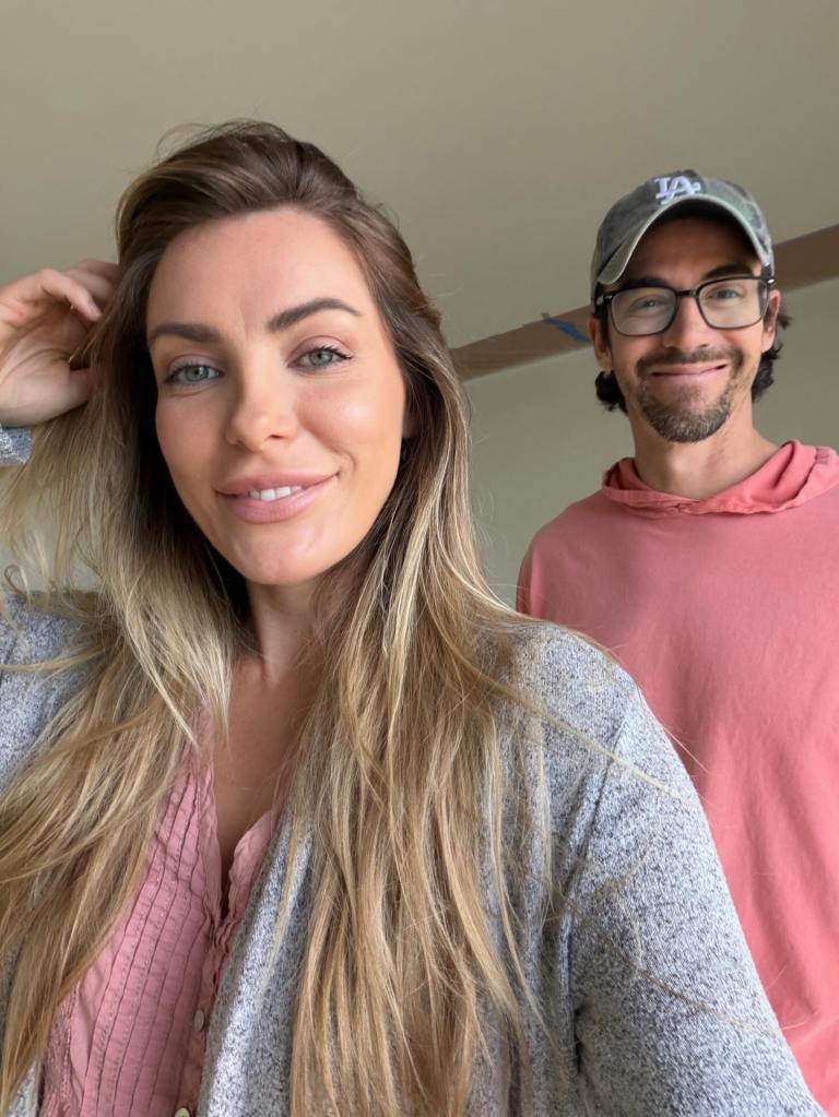 Crystal Harris and James Ward smiling at the camera.
