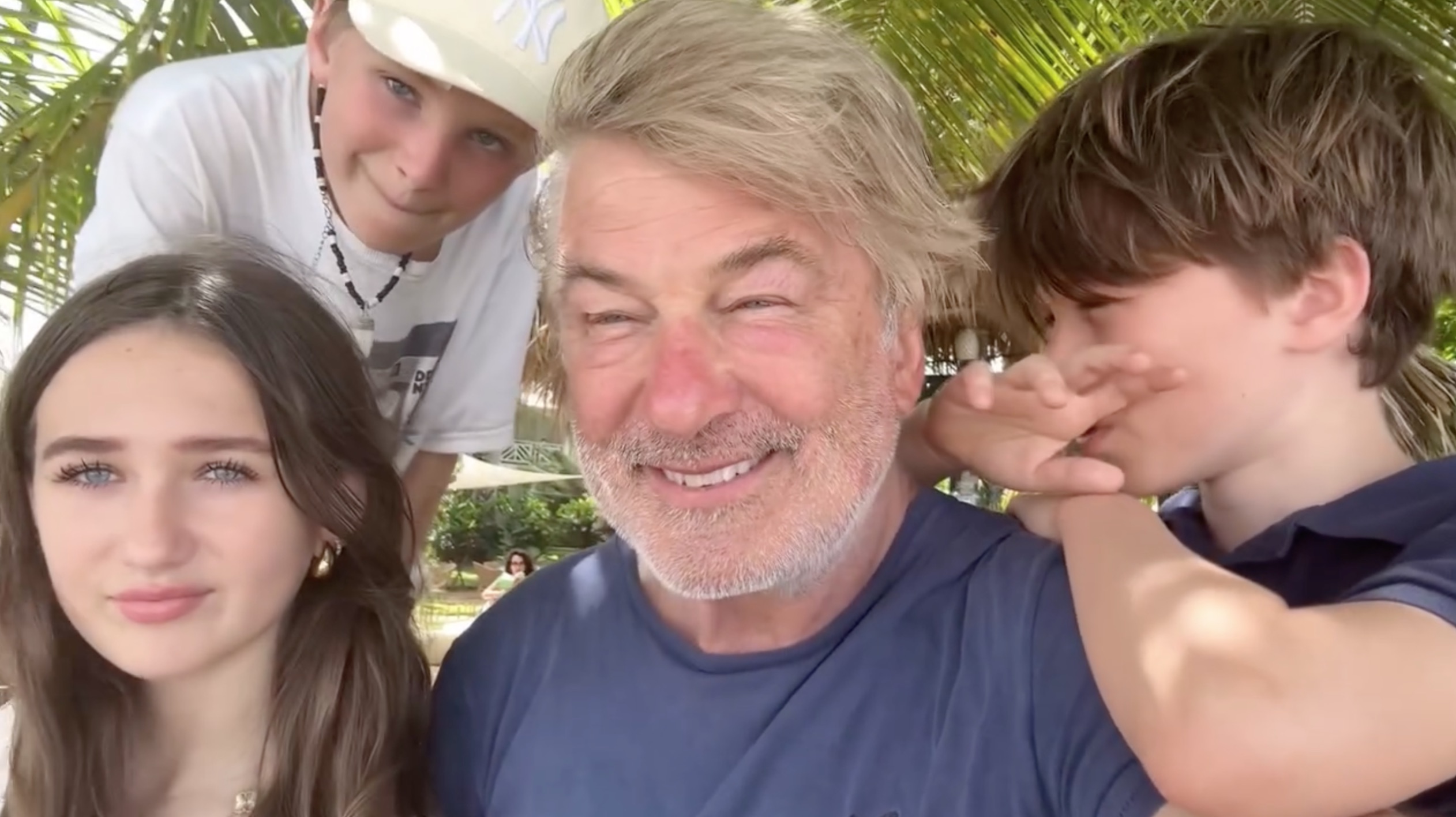 Alec Baldwin and his three children pose for a selfie.
