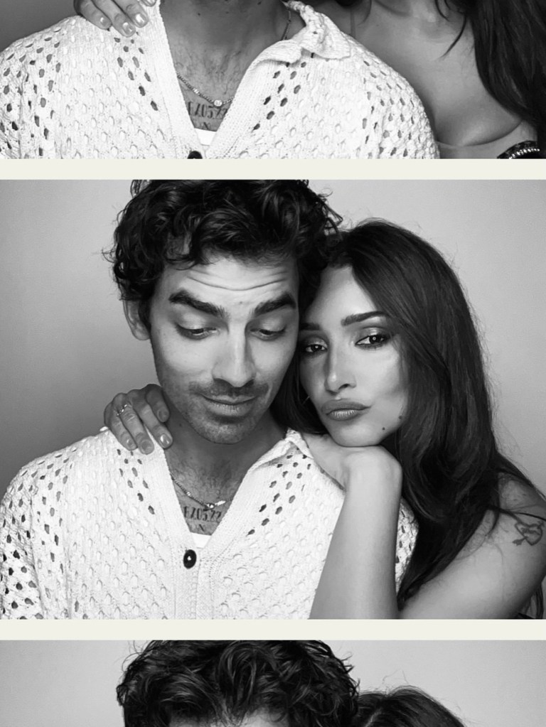 Black and white photo of Joe Jonas and Tatiana Gabriela posing together.