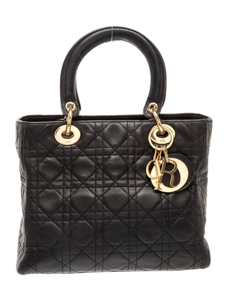Black Lady Dior bag with gold-tone hardware.