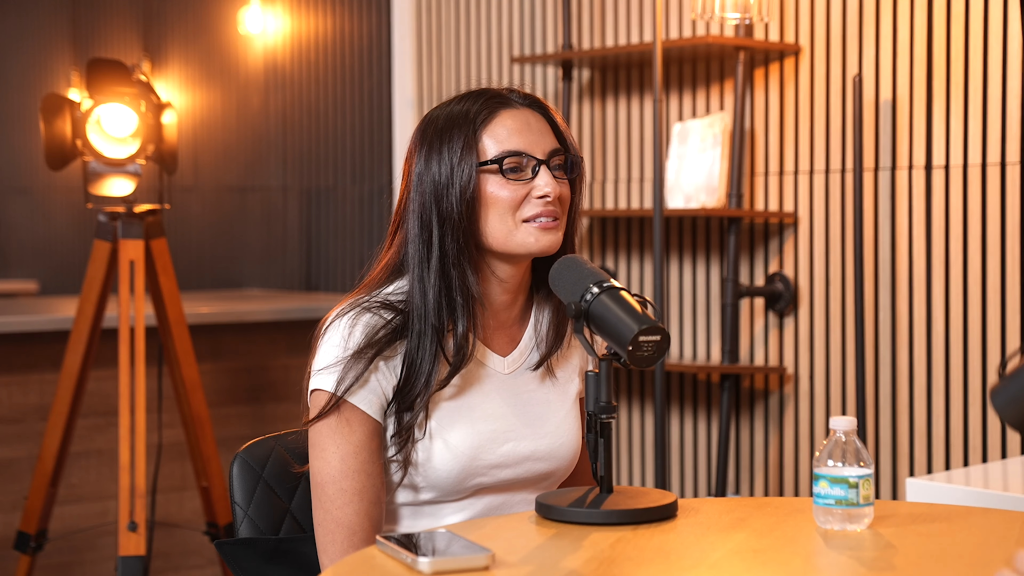 Paige DeSorbo speaking into a microphone.