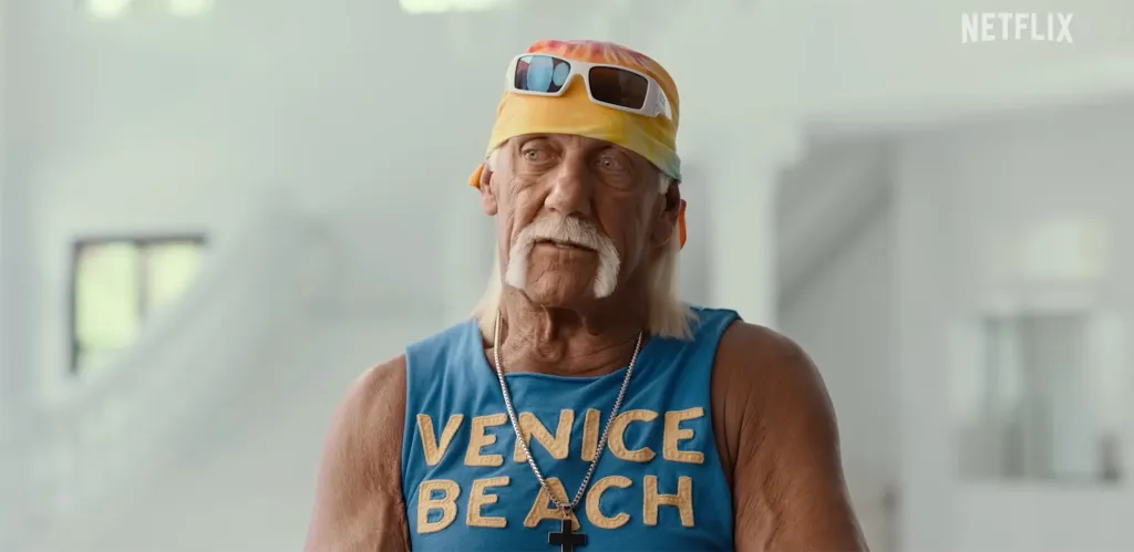 Hulk Hogan wearing a colorful headband with sunglasses, a blue 
