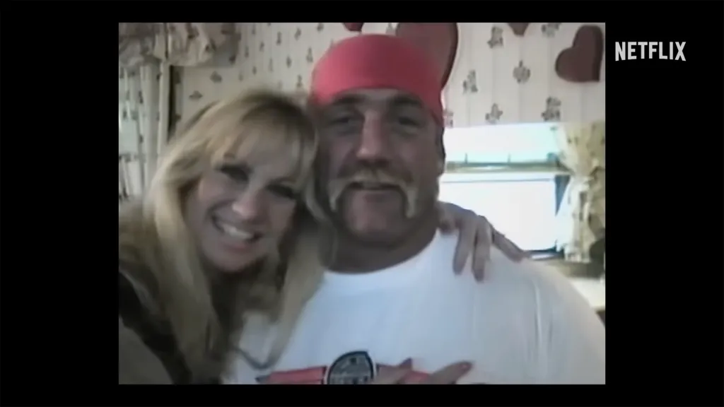 Hulk Hogan in a red bandana and a woman with blonde hair smiling.