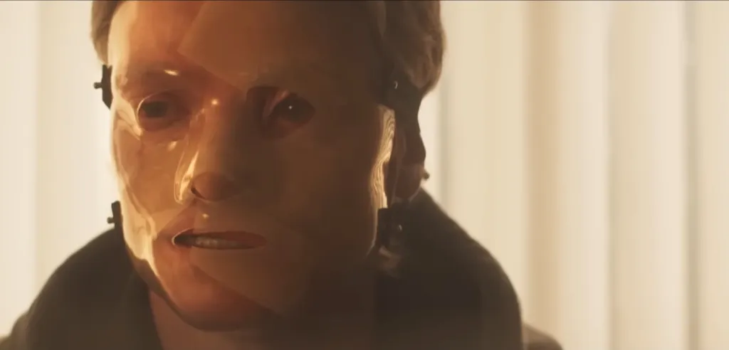 Matt Hagen, as Clayface, wears a transparent face mask.