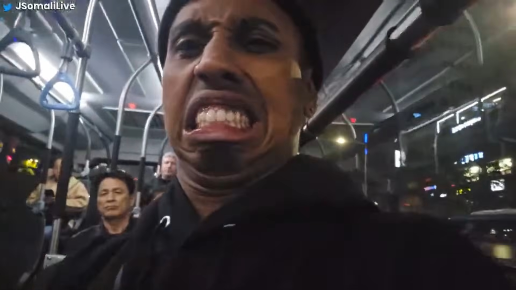 Ismael makes a face on a South Korean bus during his public live-stream stunt.