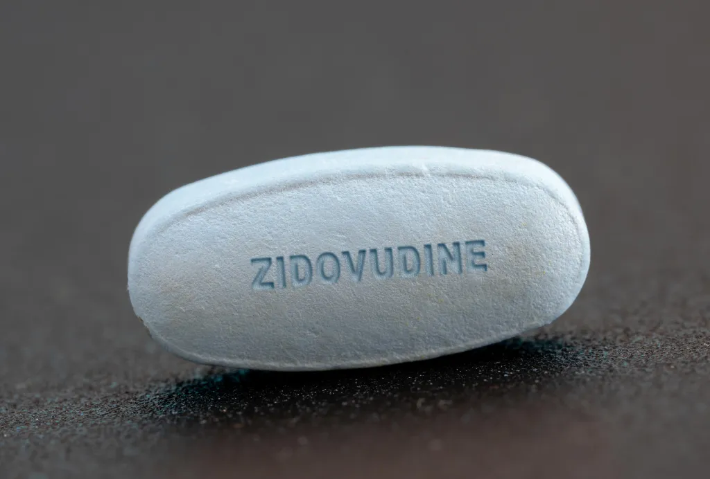 Close-up of a blue pill with 