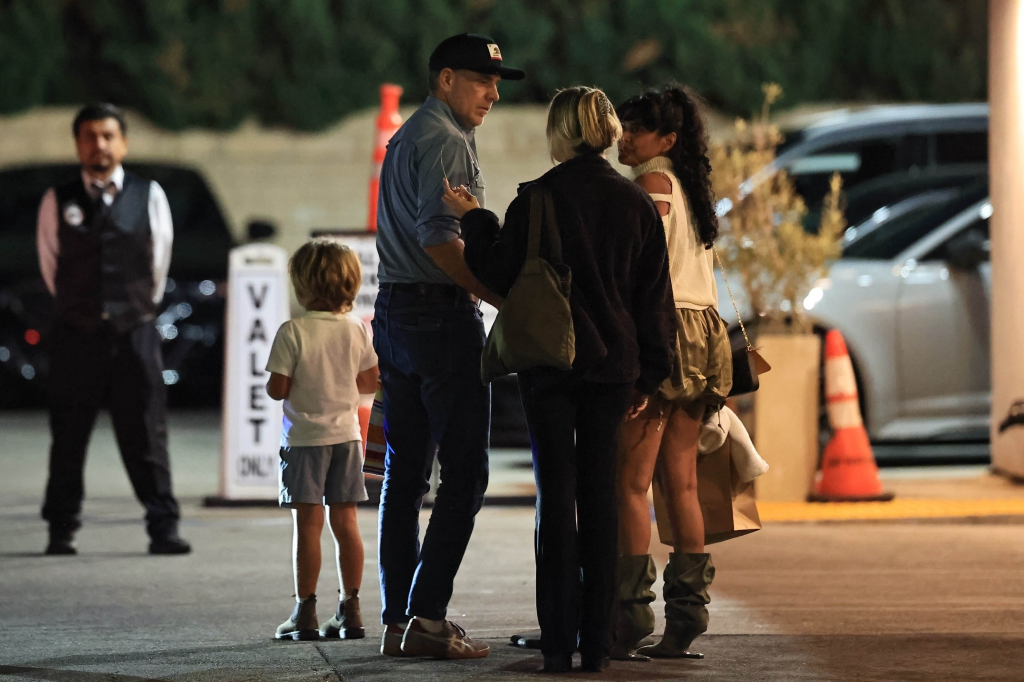 Hunter Biden and Melissa Cohen with a child and another woman.