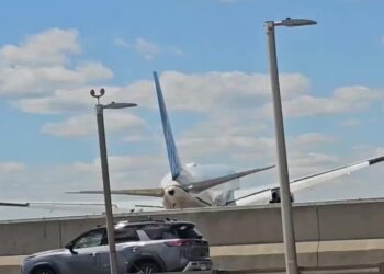 Tractor-Trailer and Light Post Damaged as Plane Lands at Newark Airport