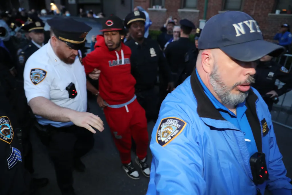 Police and protesters supporting Israel and Palestine clash near Young Israel Synagogue of Midwood during protest of 