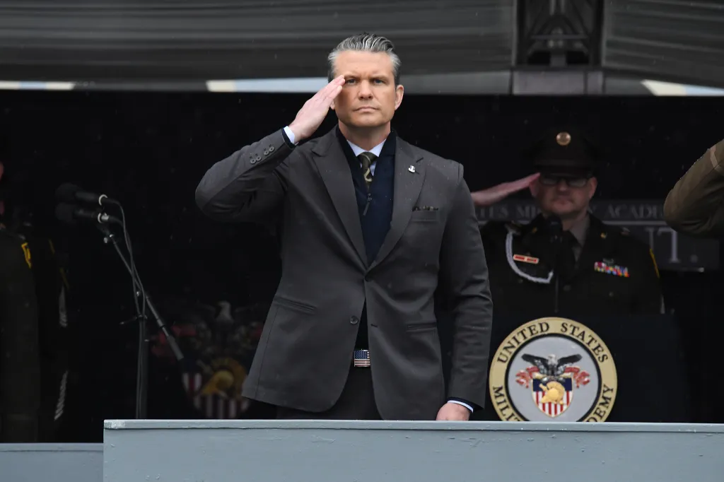Secretary of War Pete Hegseth salutes while speaking at the West Point Graduation.