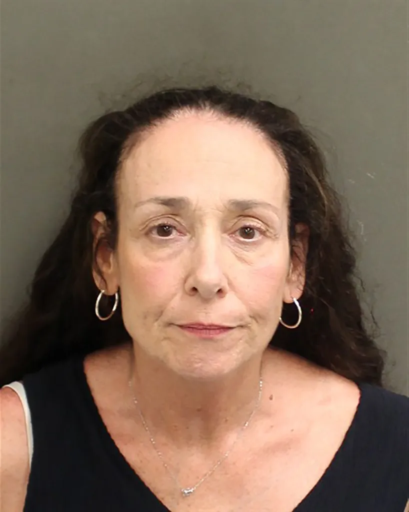 Arrest photo of Leslie Varley, 57, who allegedly attacked managers at a Disney World restaurant.