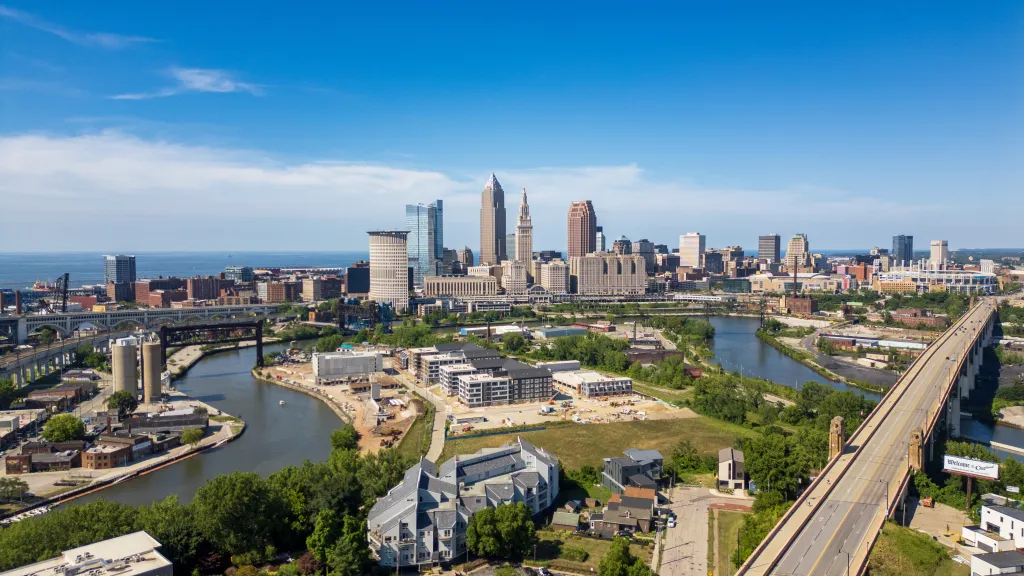 Aerial view of the Downtown Cleveland skyline and Cuyahoga River.