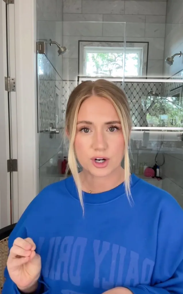 Lauren Burnham addressing the Alex Cooper beef in a video.