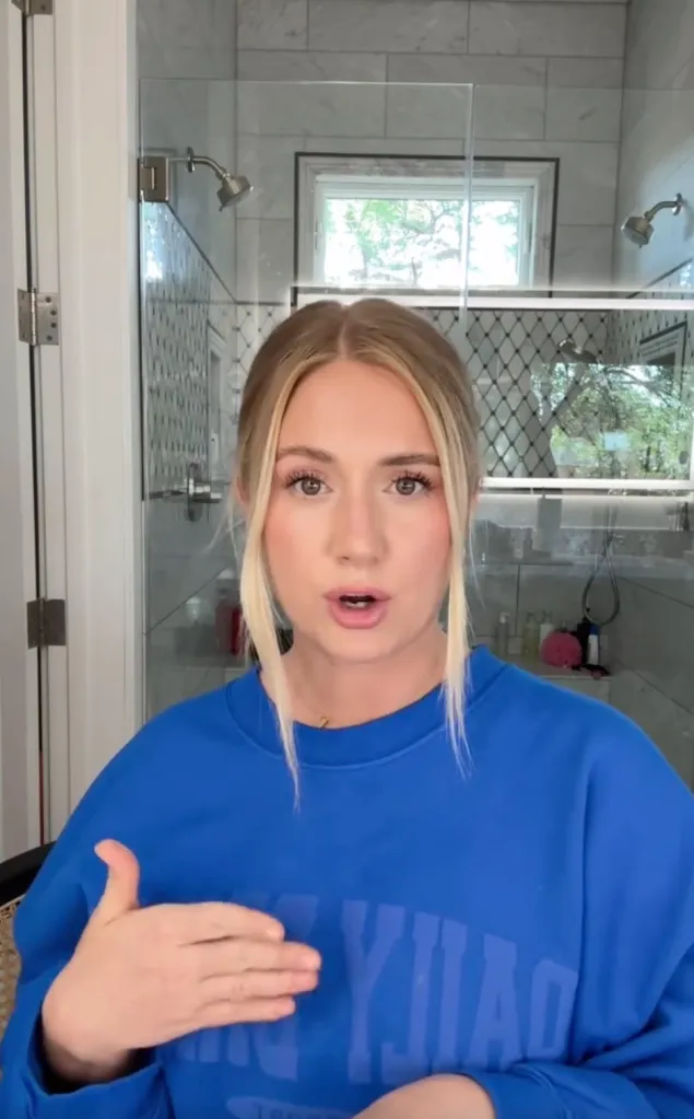 Lauren Burnham and her husband smiling at the camera.