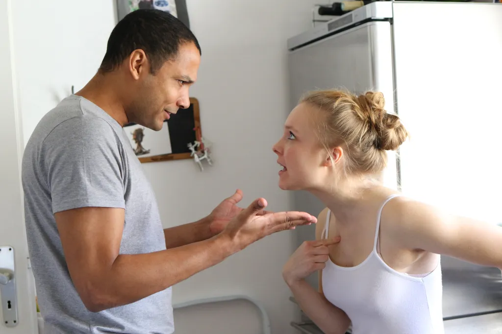 Interracial couple arguing.