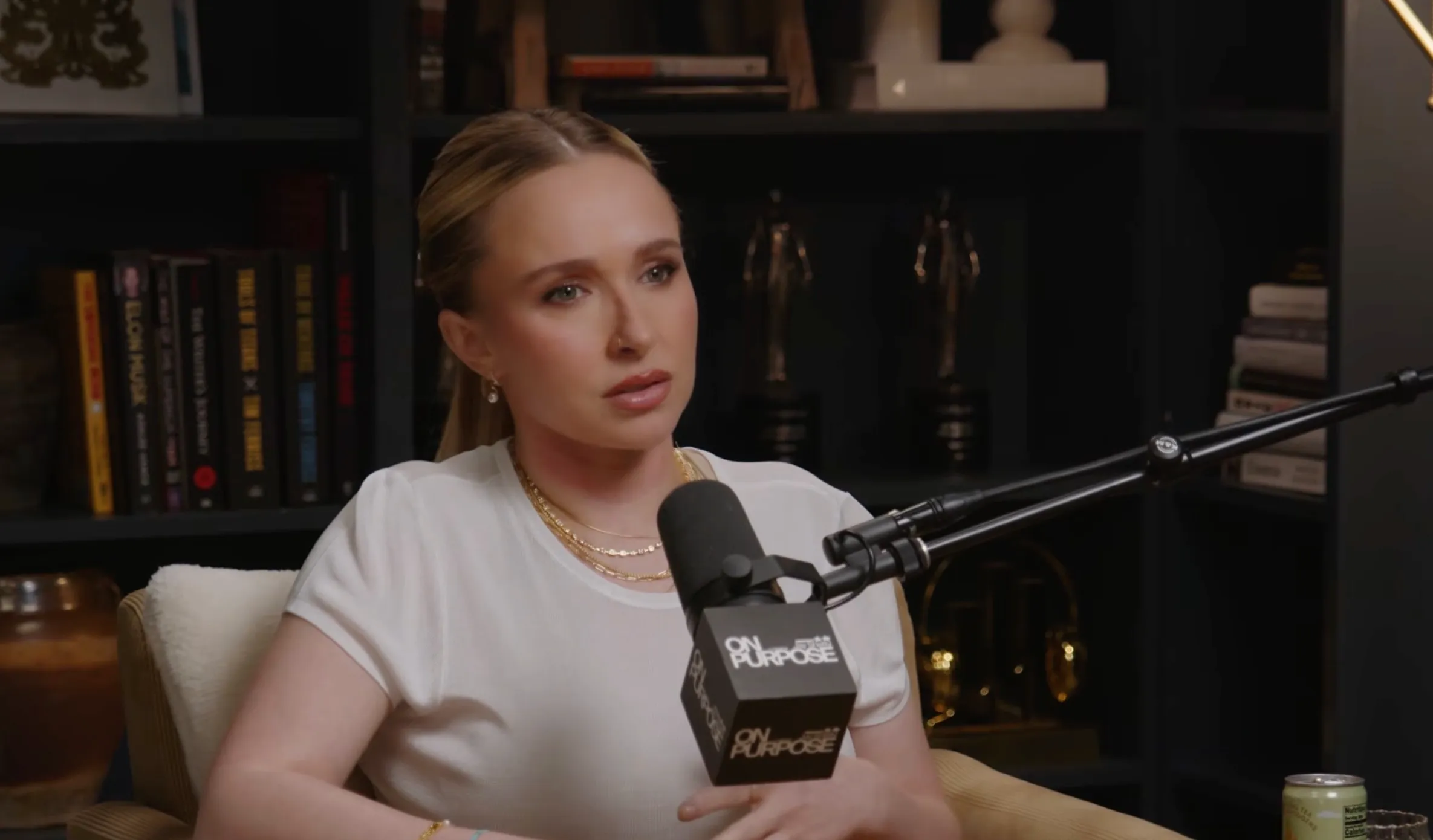 Hayden Panettiere speaking into a podcast microphone.