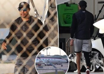 Tiger Woods pictured getting off private plane after month-long rehab stint for DUI arrest