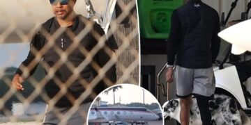 Tiger Woods pictured getting off private plane after month-long rehab stint for DUI arrest