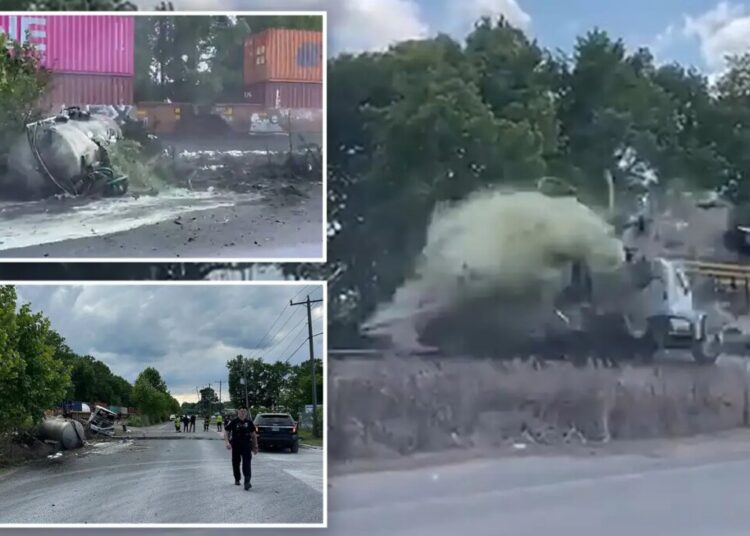 Horror as train collides with truck carrying septic tank, seriously injuring driver: video