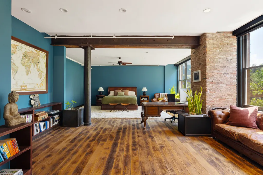 Rather than maximizing bedroom count, the owners intentionally designed the home as a sprawling entertainment-focused loft with two oversized bedroom wings that each exceed 1,000 square feet.