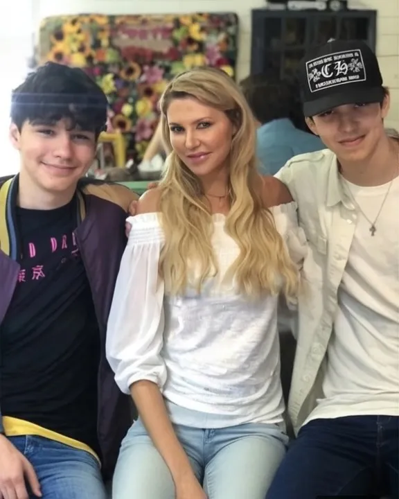 Brandi Glanville wearing bunny ears with her sons, Mason and Jake.