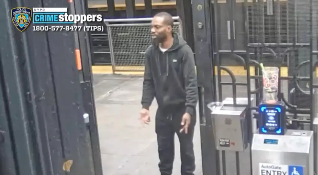 A surveillance image of an individual sought in connection with an assault on a subway platform.