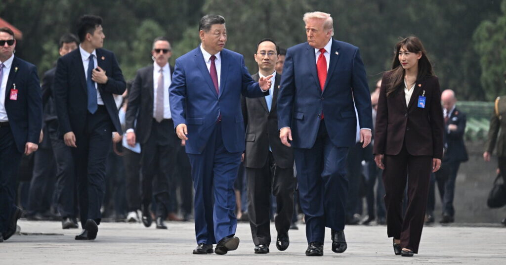 Flags, Flattery and a Blunt Warning on Trump’s First Day in China