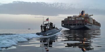 Cargo ship near the Strait of Hormuz comes under attack by multiple small boats as the U.S. and Iran exchange peace plans