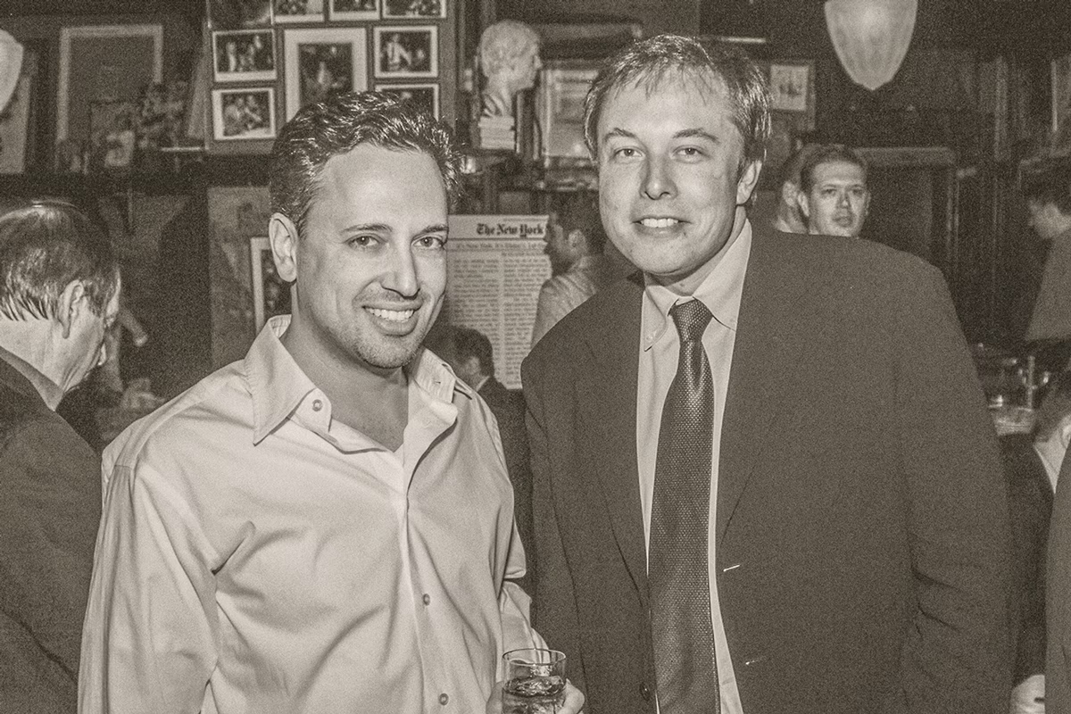 photo of 2 men at cocktail party