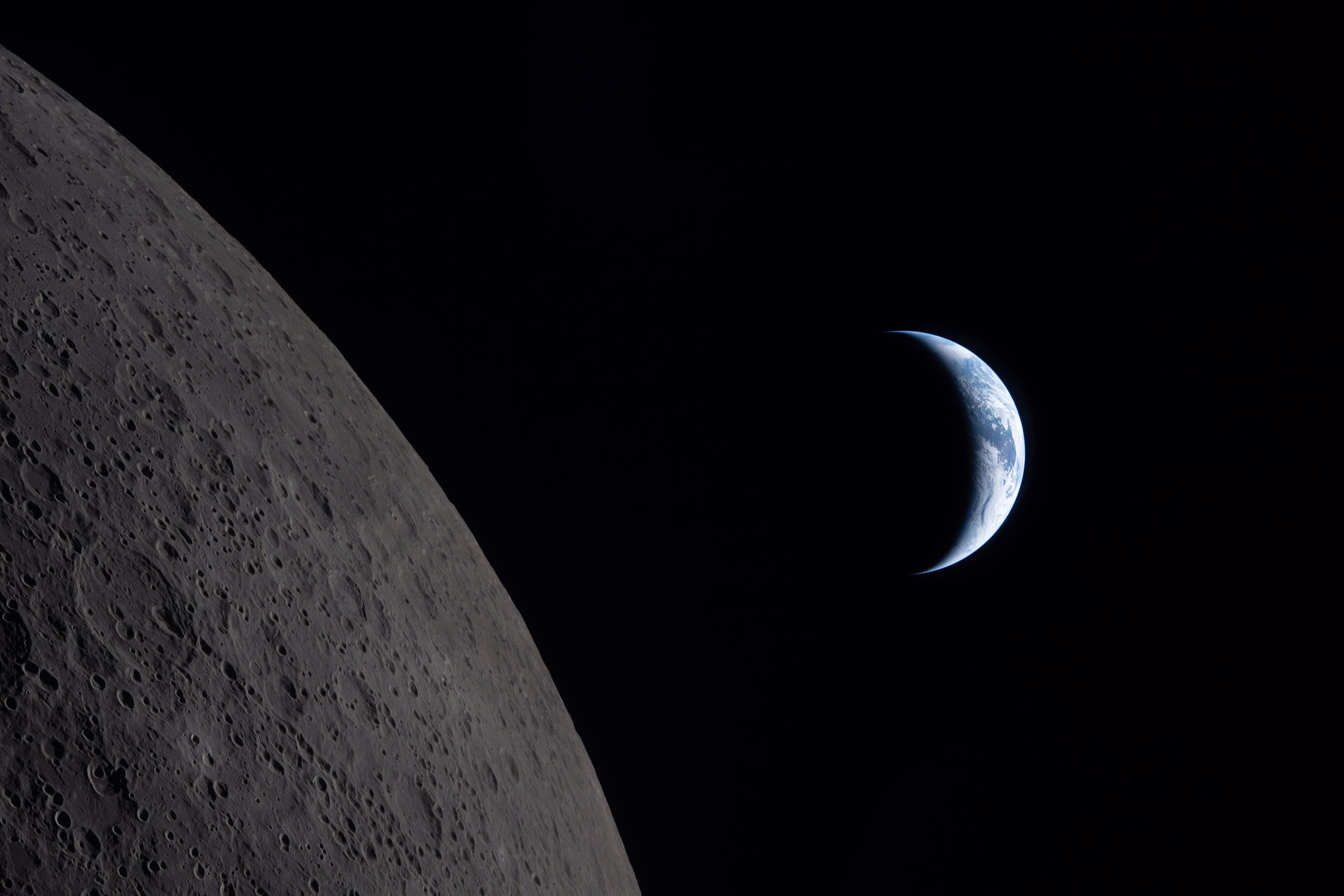 A view of Earth, seen as Artemis II passes around the far side of the moon