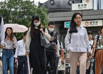 Tokyo is throwing out its strict office dress code and asking workers to wear shorts amid the war in Iran energy crisis