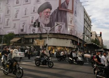 Iran is setting up an agency to tax ships passing through Hormuz even as it negotiates a peace deal