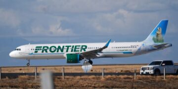 Pedestrian who jumped Denver airport fence dies after being hit by Frontier Airlines plane, sparking an engine fire and forcing passengers to evacuate