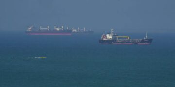 Shaky Iran war ceasefire tested again as drone hits cargo ship off Qatar coast while Kuwait and UAE repel drone attacks